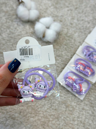 کش موی کورومی